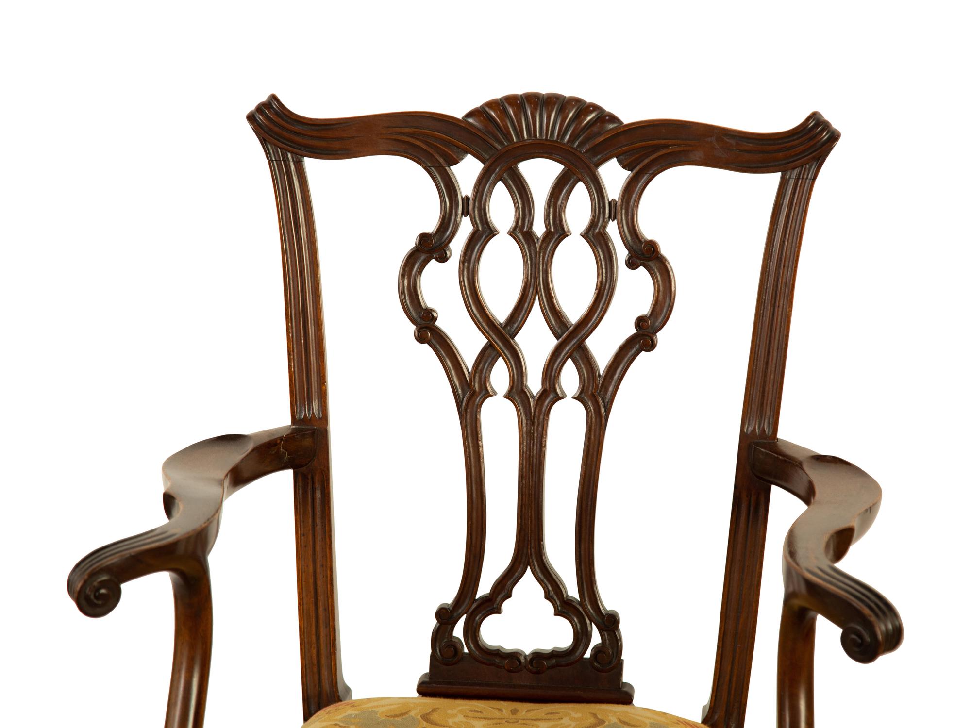 A Set of Fourteen George III Style Mahogany Dining Chairs