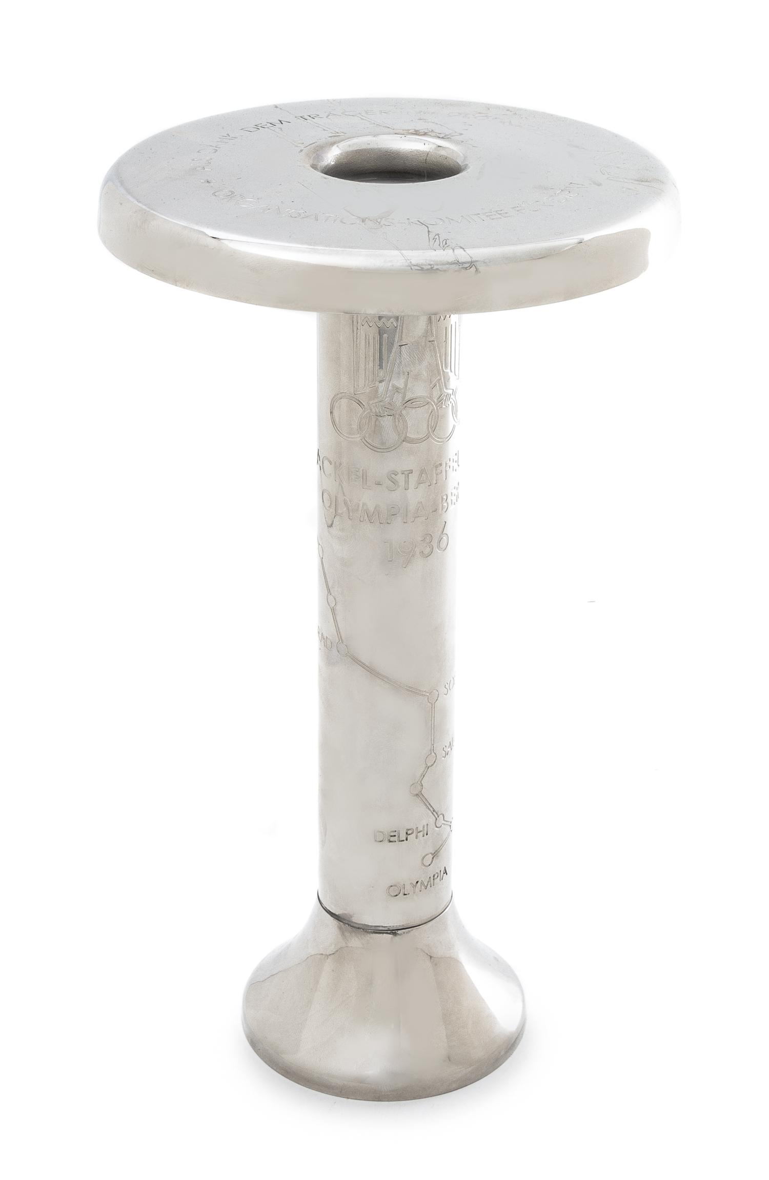 A 1972 Olympics Presentation Torch Height 10 3/4 inches.