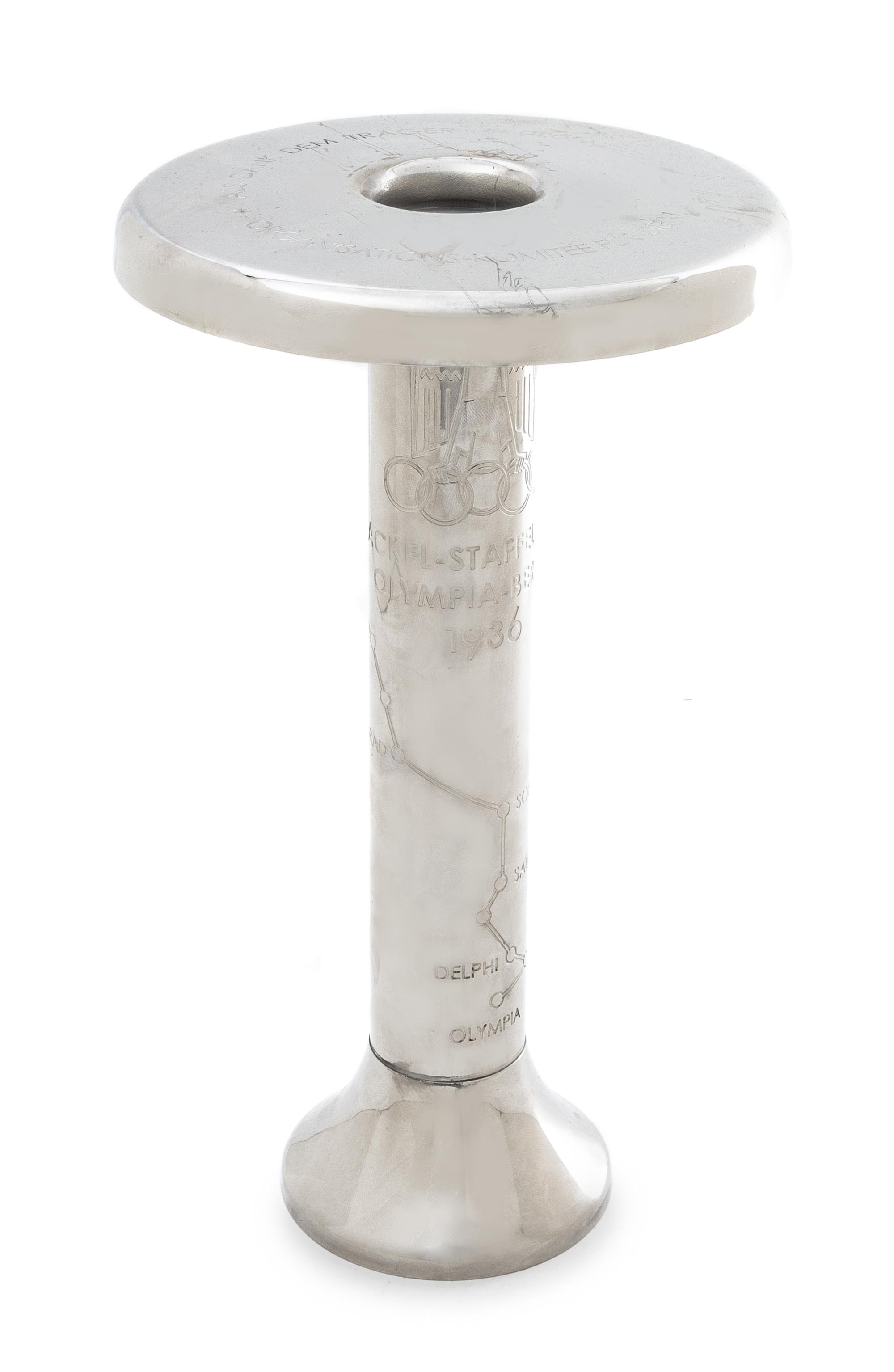A 1972 Olympics Presentation Torch Height 10 3/4 inches.