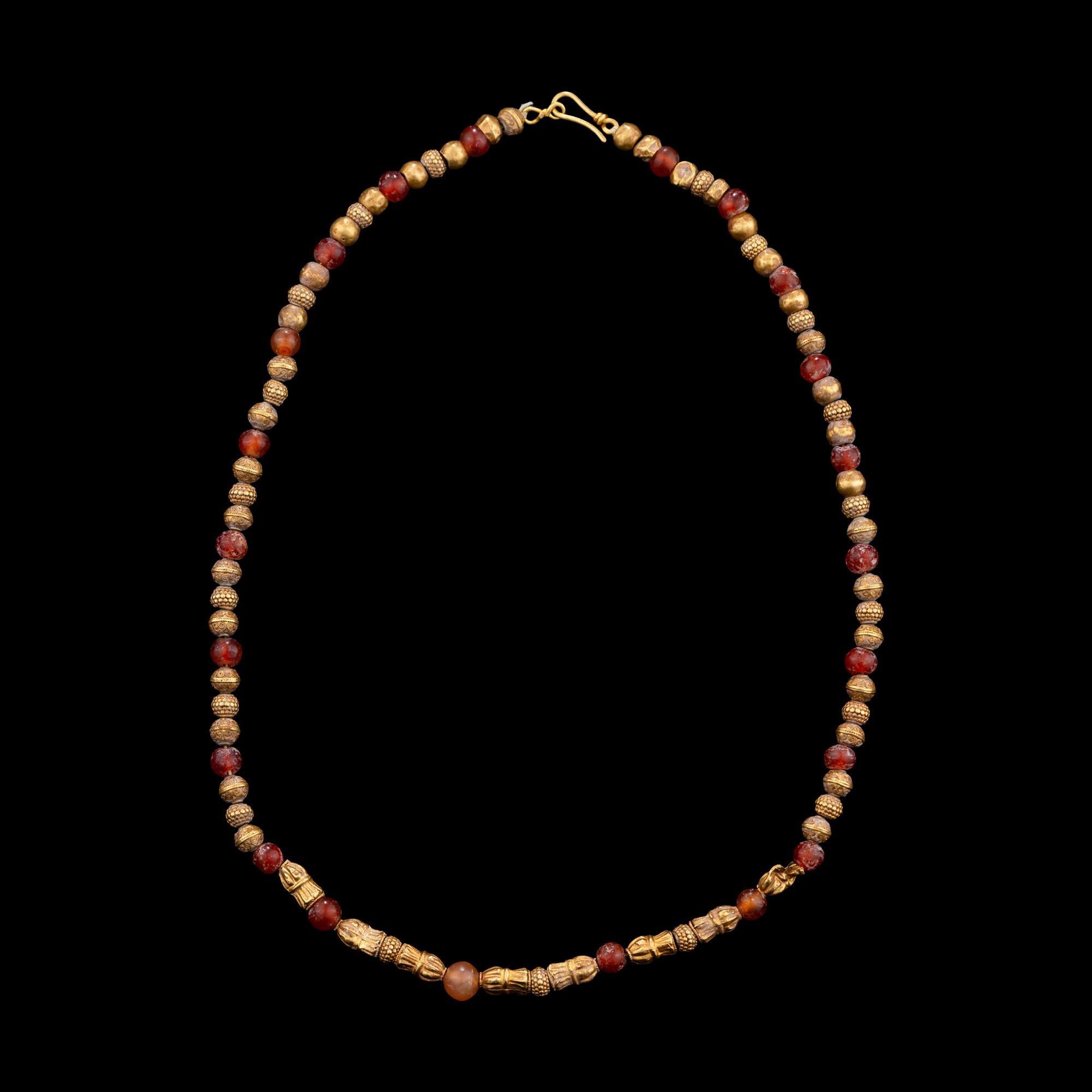 A Bactrian Carnelian and Gold Beaded Necklet