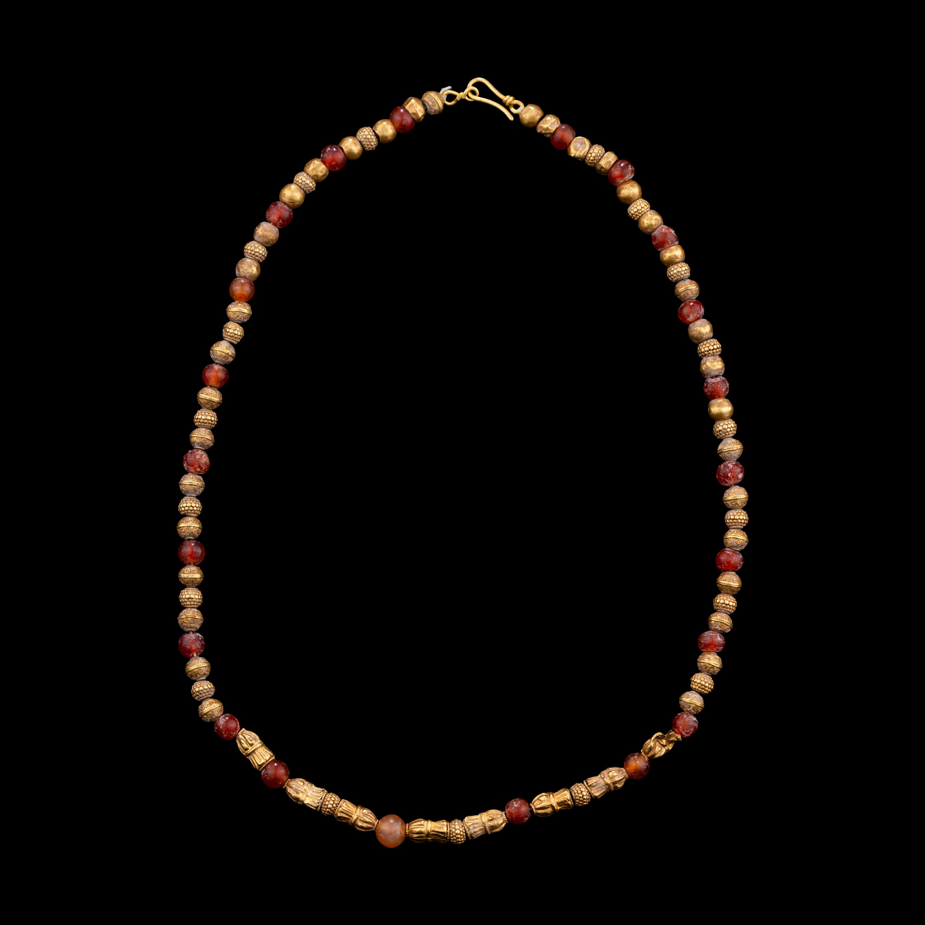 A Bactrian Carnelian and Gold Beaded Necklet