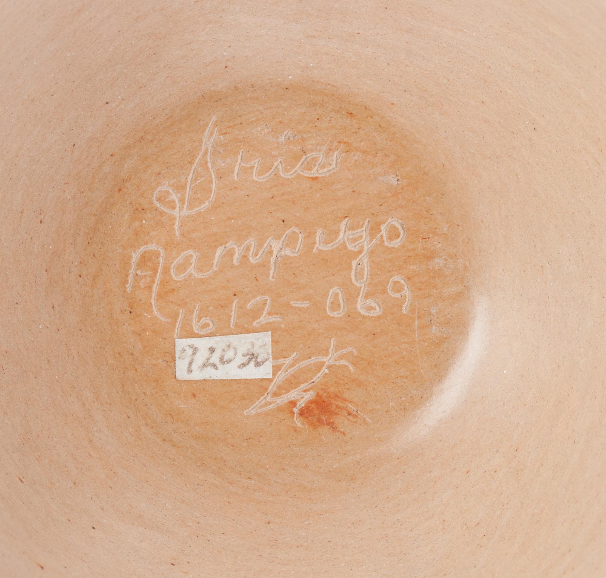 Buff Pottery Jar, with Corn Relief