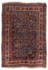 A Shiraz Wool Rug 5 feet 5 inches x 7 feet 4 inches. — WEST PERSIA, CIRCA 1920