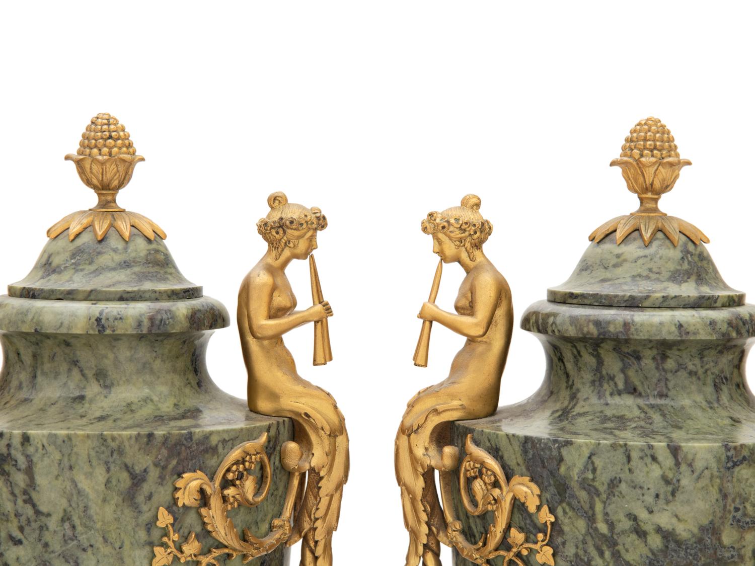 A Pair of French Gilt Bronze Mounted Marble Urns