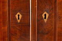 An Italian Parcel Ebonized Burl Walnut Cabinet-on-Chest