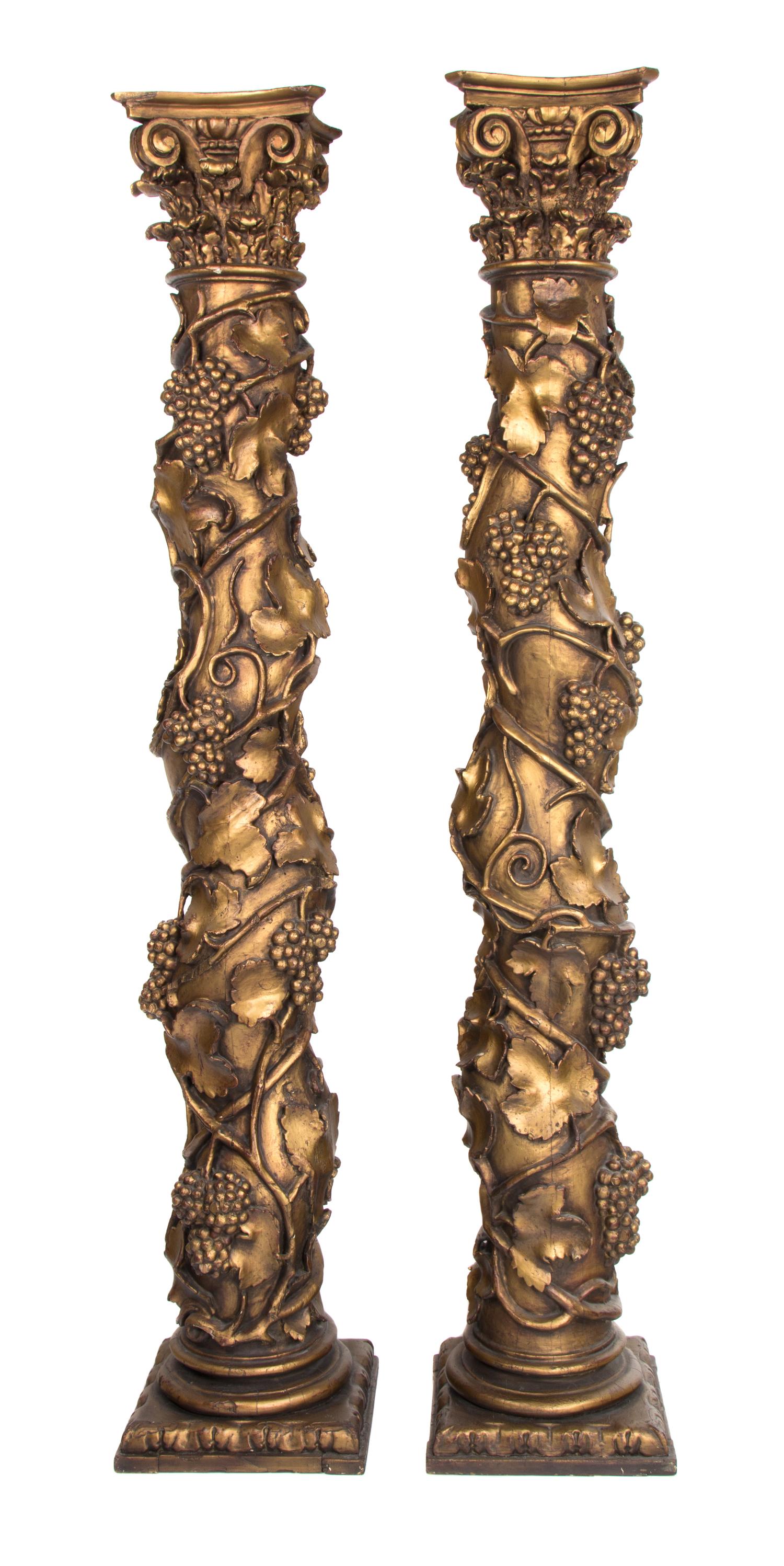 A Pair of Continental Painted and Gilt Solomonic Columns Height 81 inches. — 19TH CENTURY