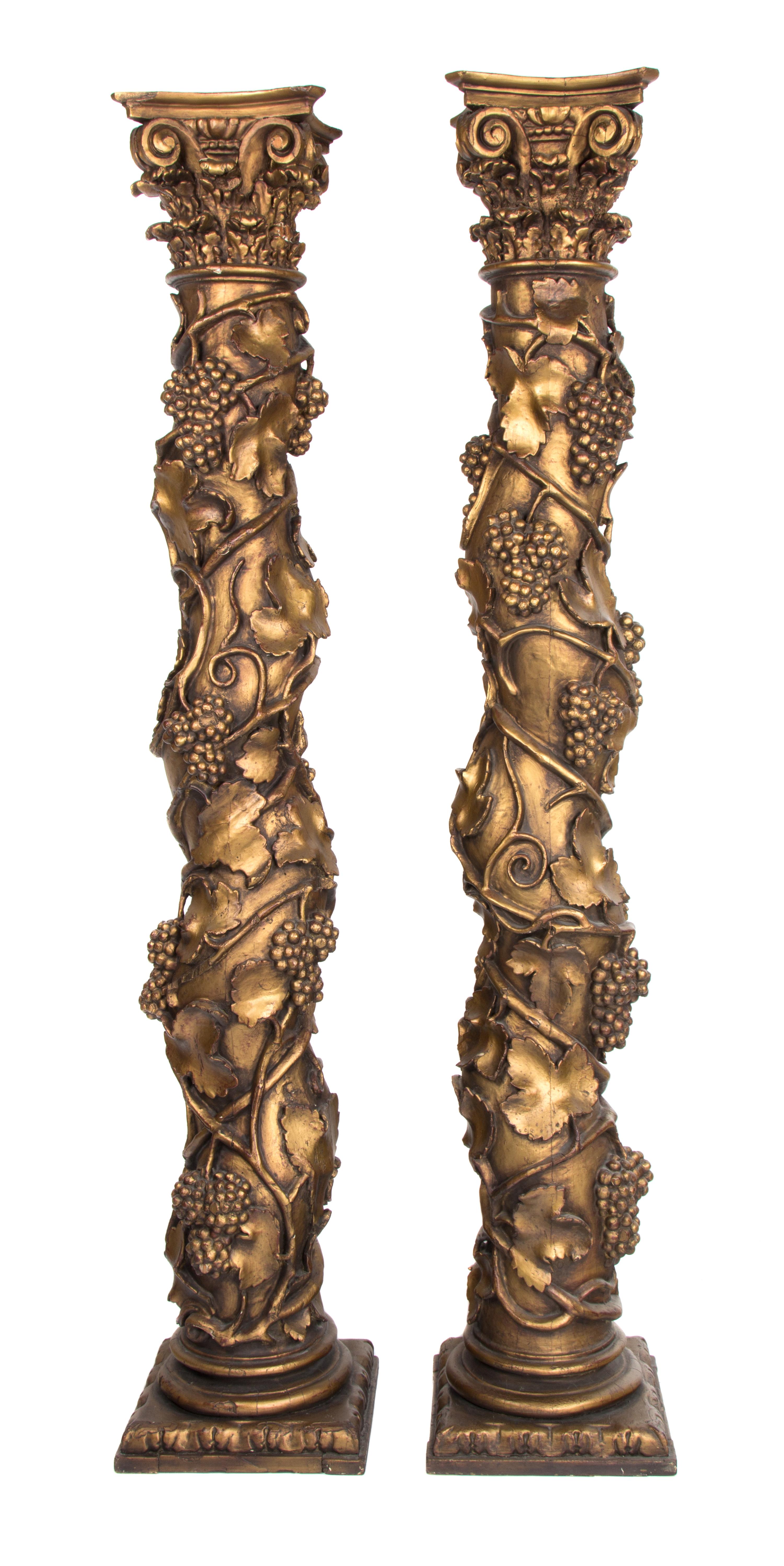 A Pair of Continental Painted and Gilt Solomonic Columns Height 81 inches. — 19TH CENTURY