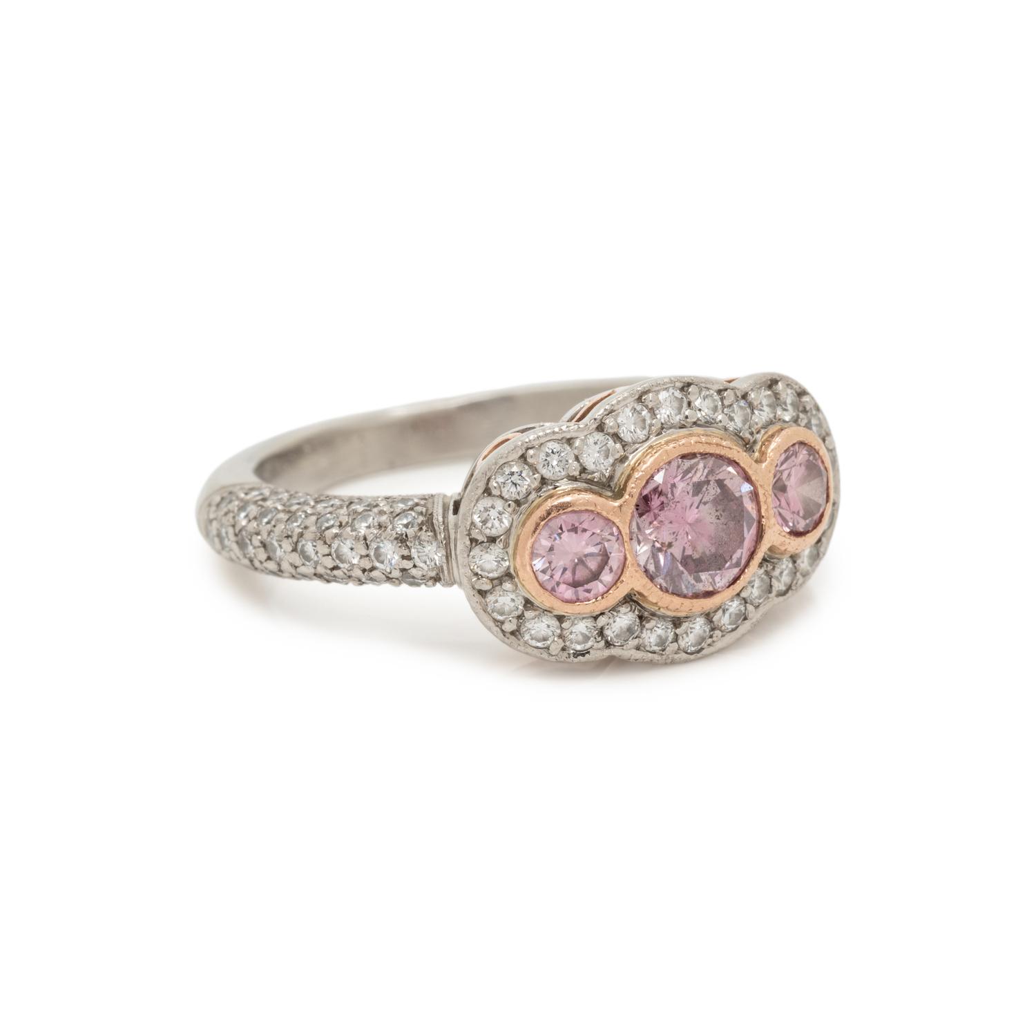 NATURAL FANCY INTENSE PURPLE-PINK DIAMOND AND DIAMOND RING