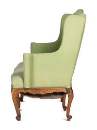 A French Provincial Carved Fruitwood Upholstered High-Back Sofa