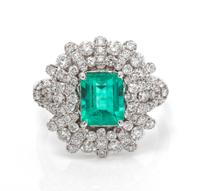 An 18 Karat White Gold, Emerald and Diamond Ring, 4.90 dwts.