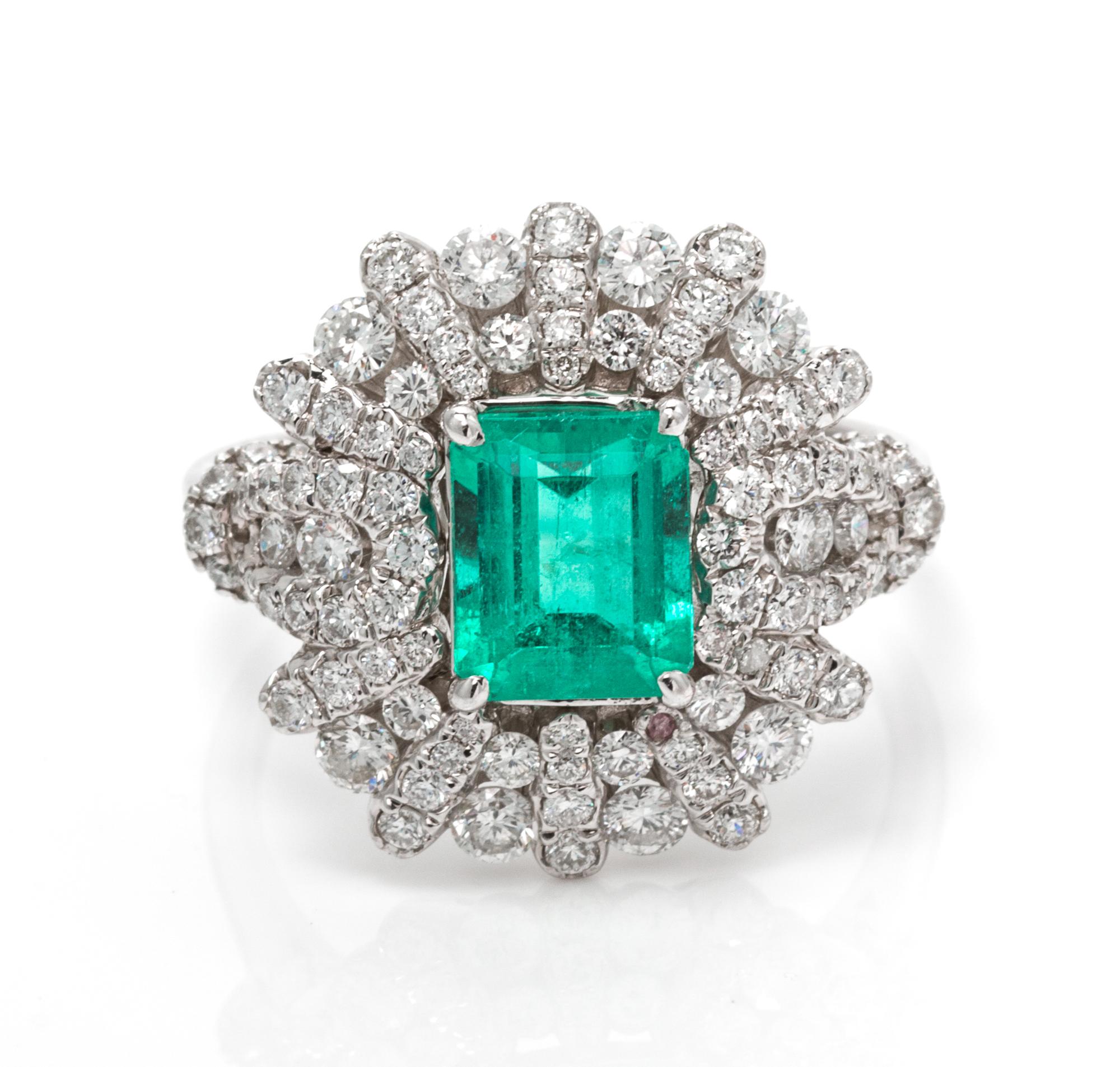 An 18 Karat White Gold, Emerald and Diamond Ring, 4.90 dwts.