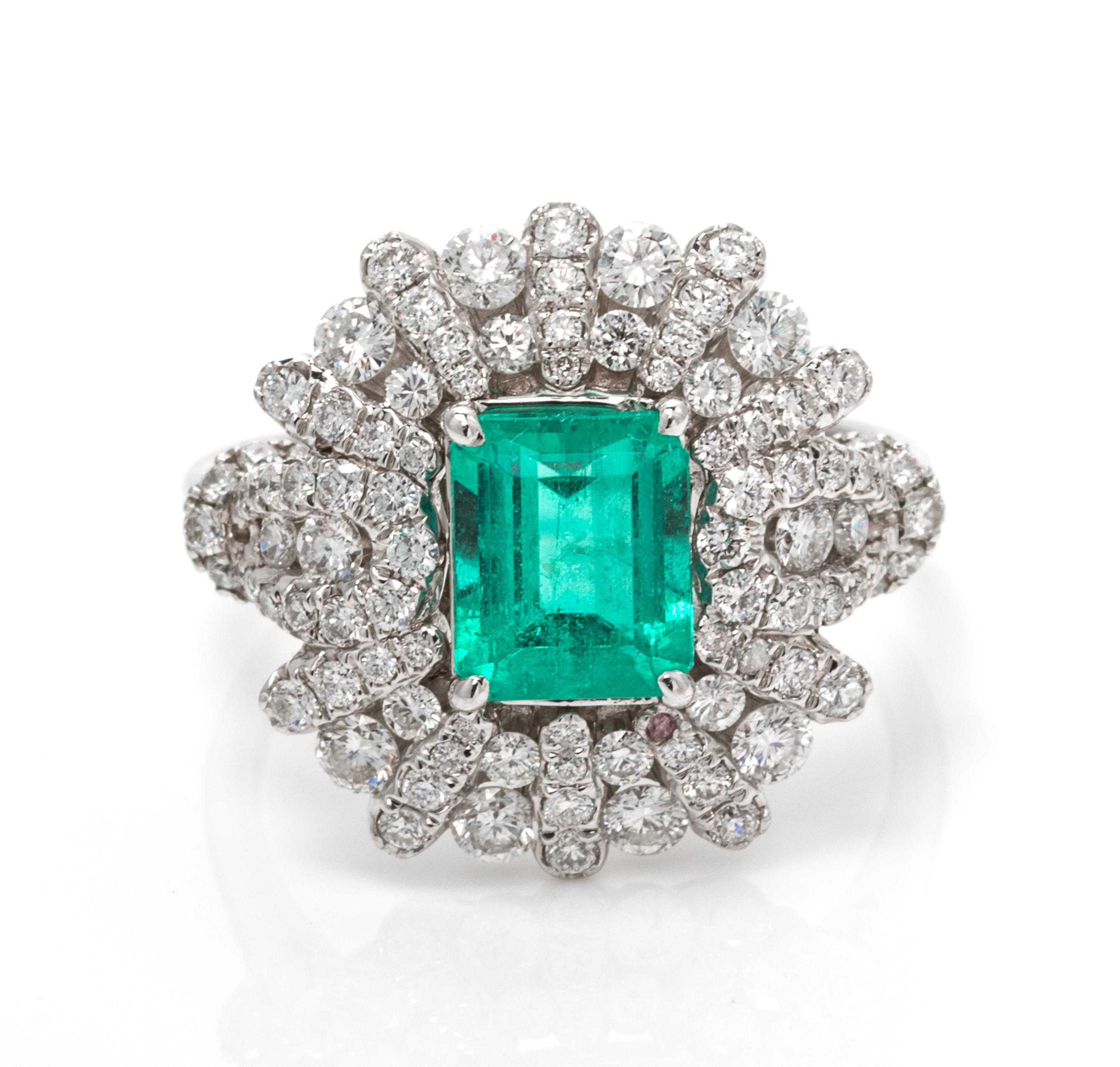 An 18 Karat White Gold, Emerald and Diamond Ring, 4.90 dwts.