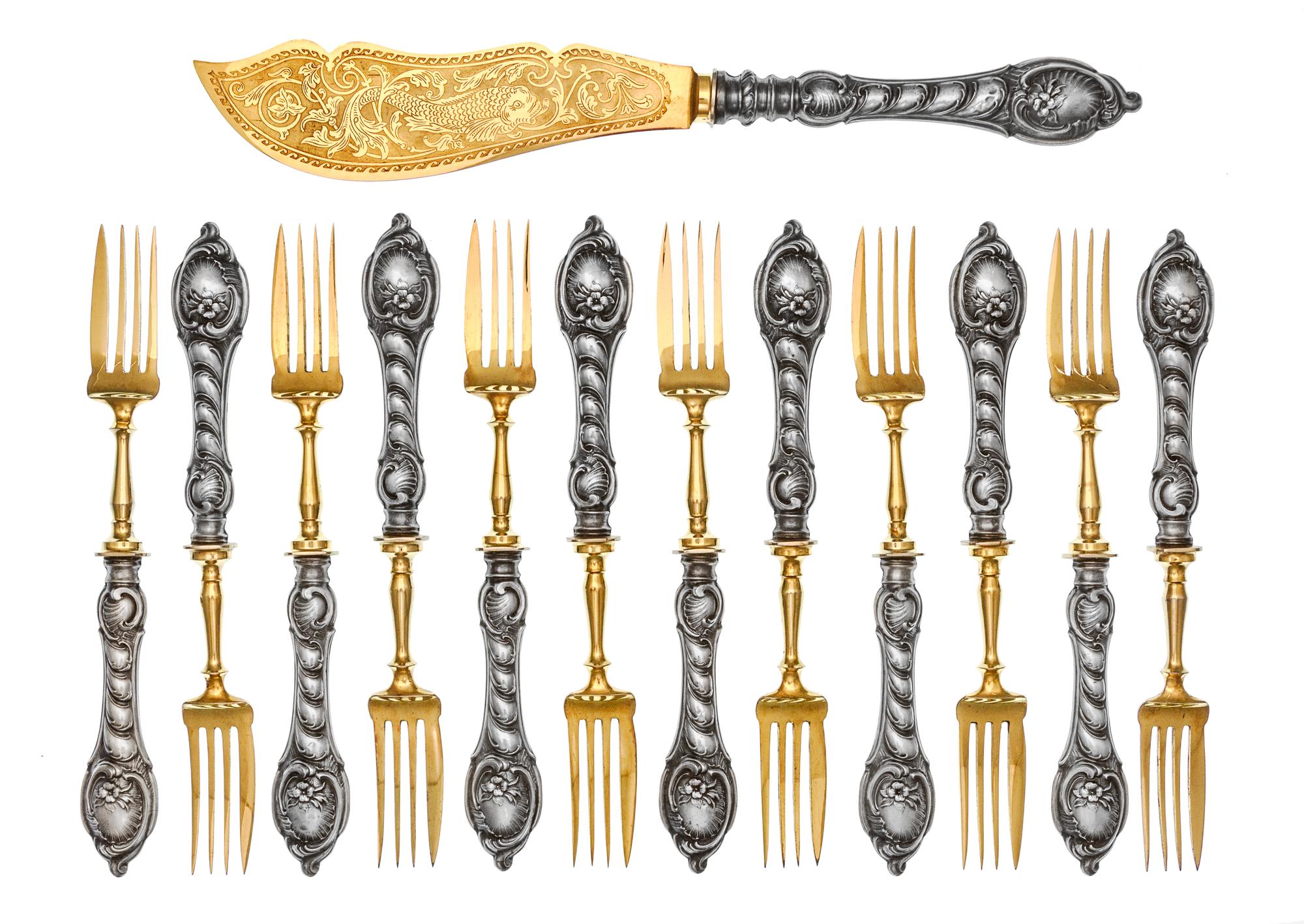 A German Silver and Parcel Gilt Fish Service, Theodor Julius Gunther, Berlin, 19th Century, comprising twelve fish forks and one fish s