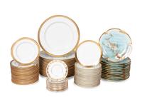 An Assembled Collection of Gilt-Edged Porcelain Dinnerware