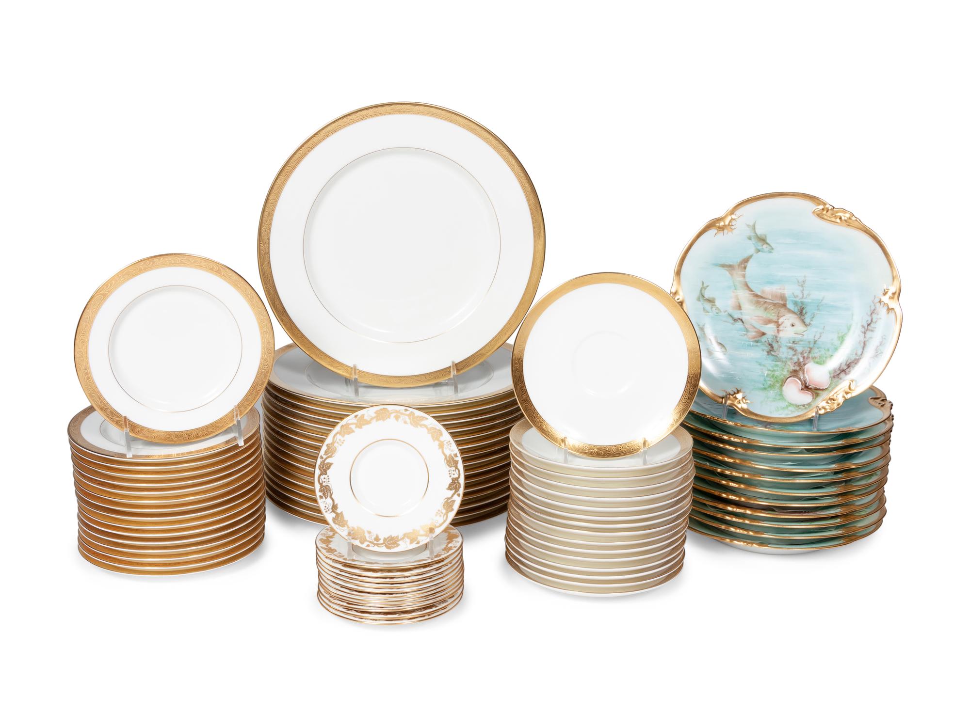 An Assembled Collection of Gilt-Edged Porcelain Dinnerware