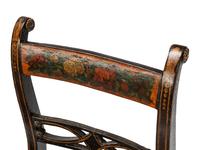 A Set of Six Regency Stencil Decorated and Parcel Gilt Ebonized Dining Chairs