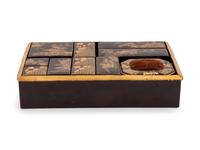 A Set of Eleven Small Japanese Gilt and Black Lacquer Stationary Boxes