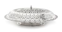 An American Silver Centerpiece Bowl, Tiffany & Co., New York, NY, 1910, circular, with turned-over border pierced and engraved with scr