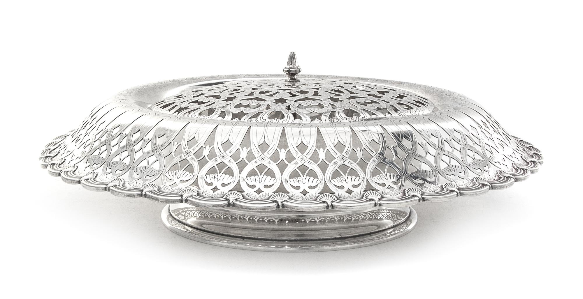 An American Silver Centerpiece Bowl, Tiffany & Co., New York, NY, 1910, circular, with turned-over border pierced and engraved with scr