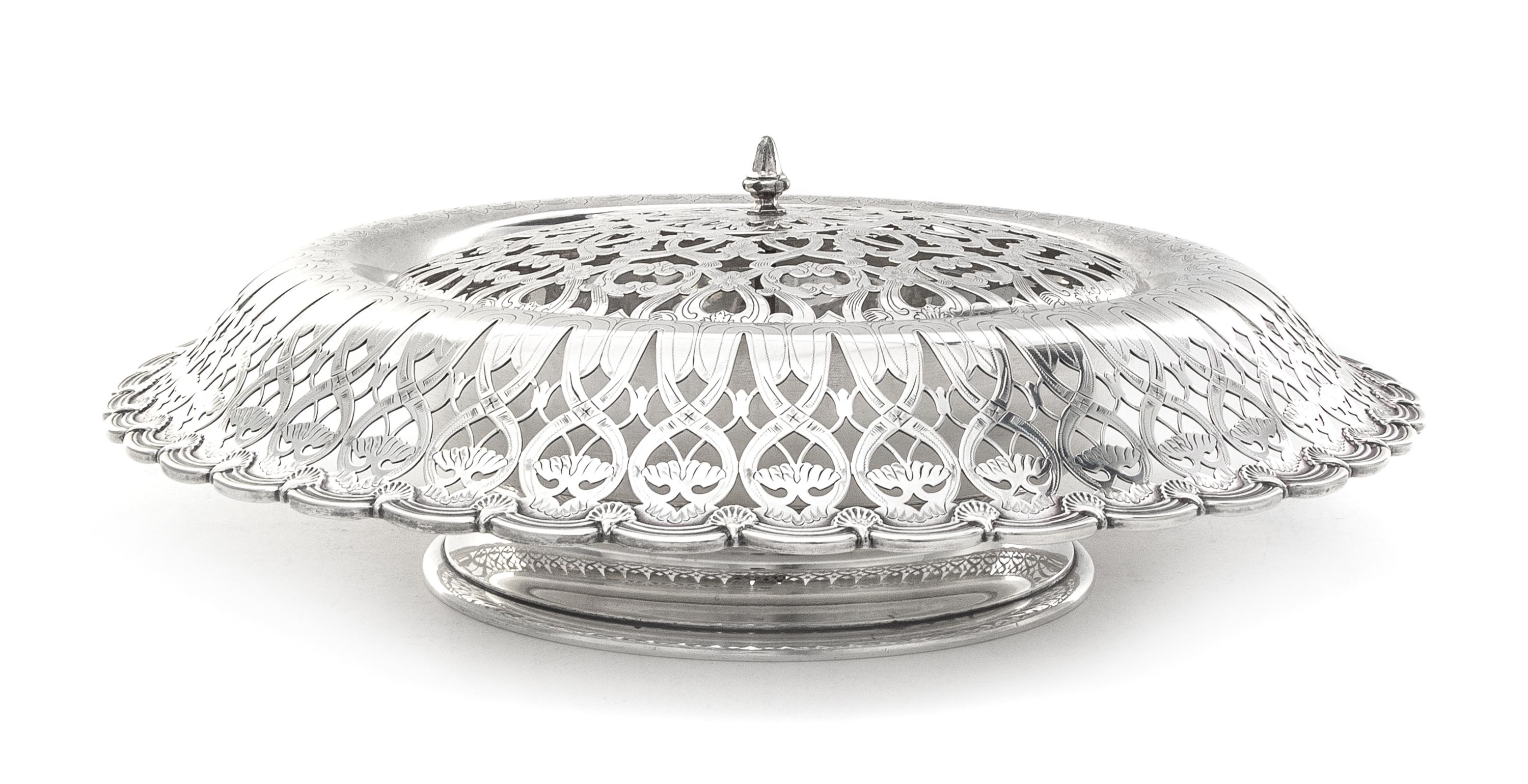 An American Silver Centerpiece Bowl, Tiffany & Co., New York, NY, 1910, circular, with turned-over border pierced and engraved with scr