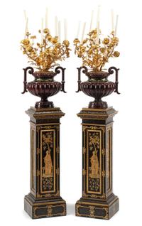 A Pair of French Enameled Cast Iron and Gilt Bronze Candelabra with Associated Painted Pedestals Height overall 69 inches.