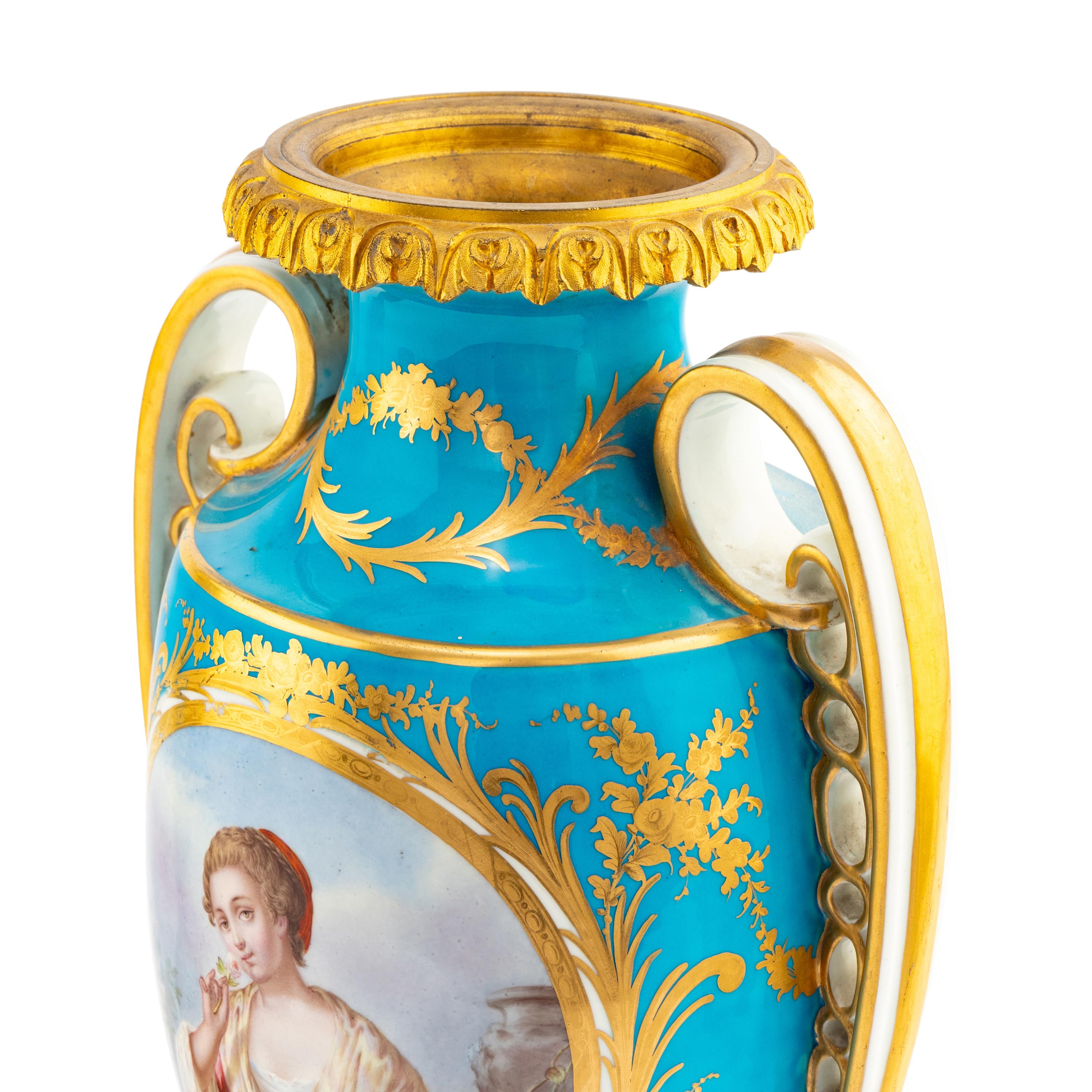A Pair of Sèvres Style Porcelain and Gilt Bronze Mounted Vases