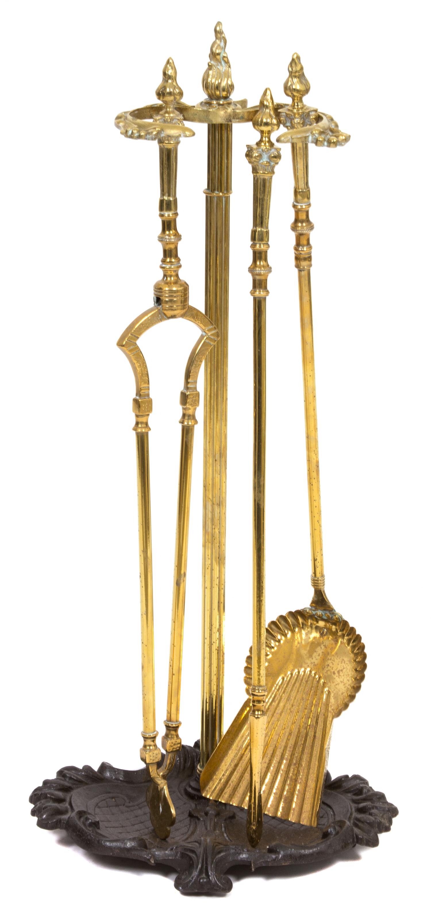 An English Victorian Brass and Wrought Iron Fire Tool Stand with Tools Height 28 inches.