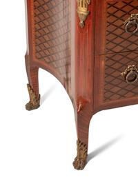A Louis XVI Style Gilt Bronze Mounted Parquetry and Floral Marquetry Marble-Top Commode