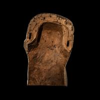 An Egyptian Painted Wood Sarcophagus Head