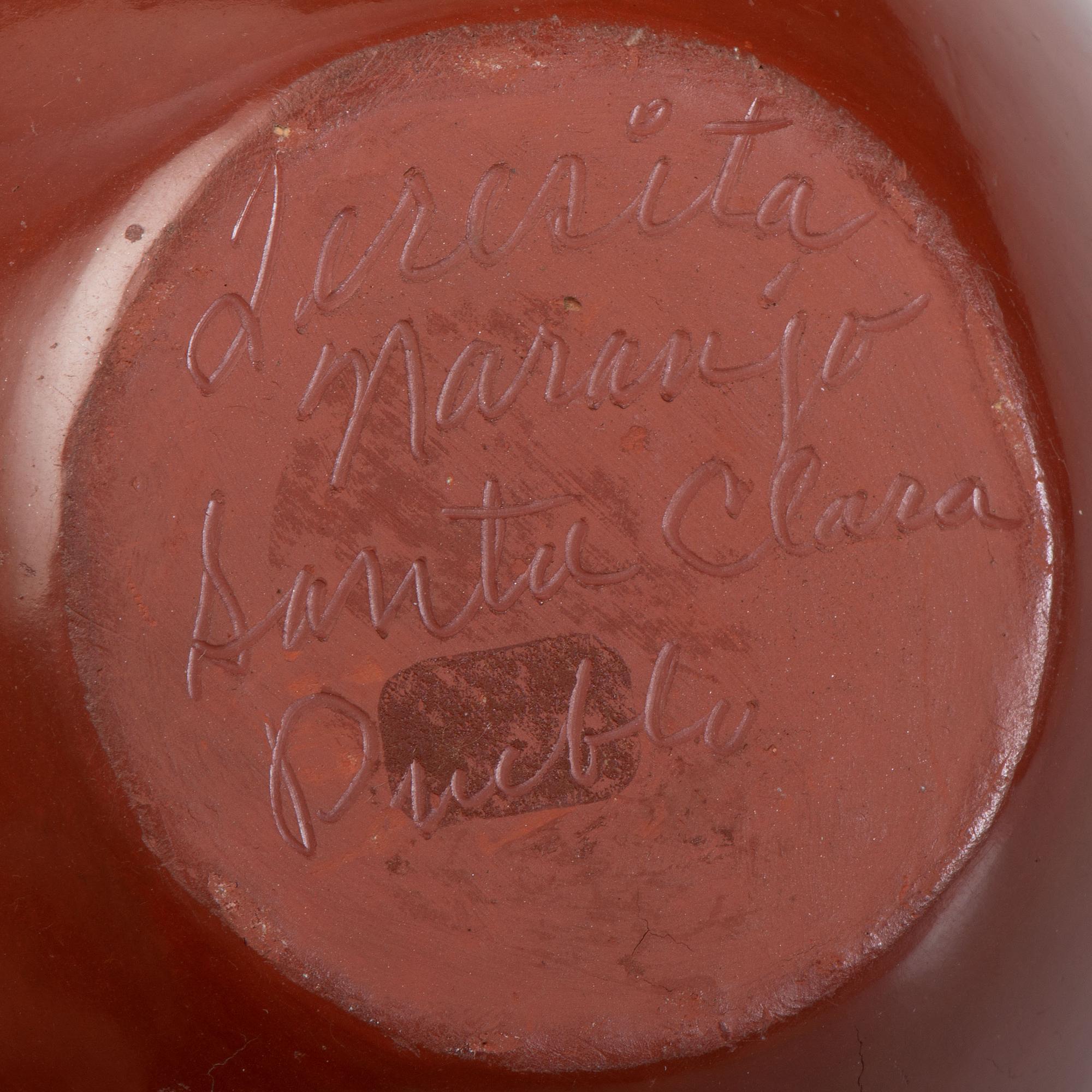 Carved Redware Jar, with Avanyu