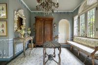 An Austrian Carved Giltwood Mantel Clock