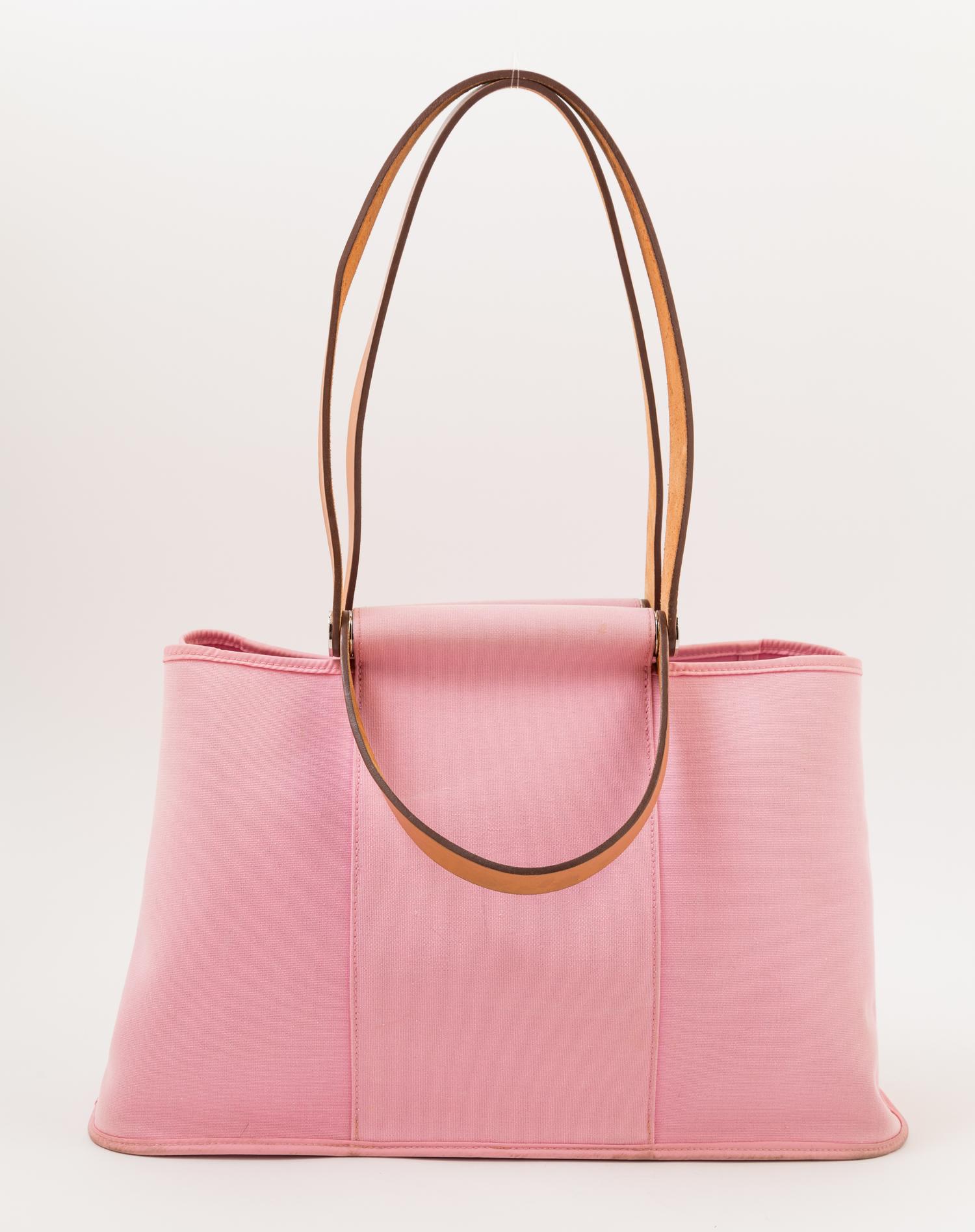 An Hermès Pink Toile Canvas Cabag Tote, 15.5" x 9.25" x 5.75"; Handle drop: 5".