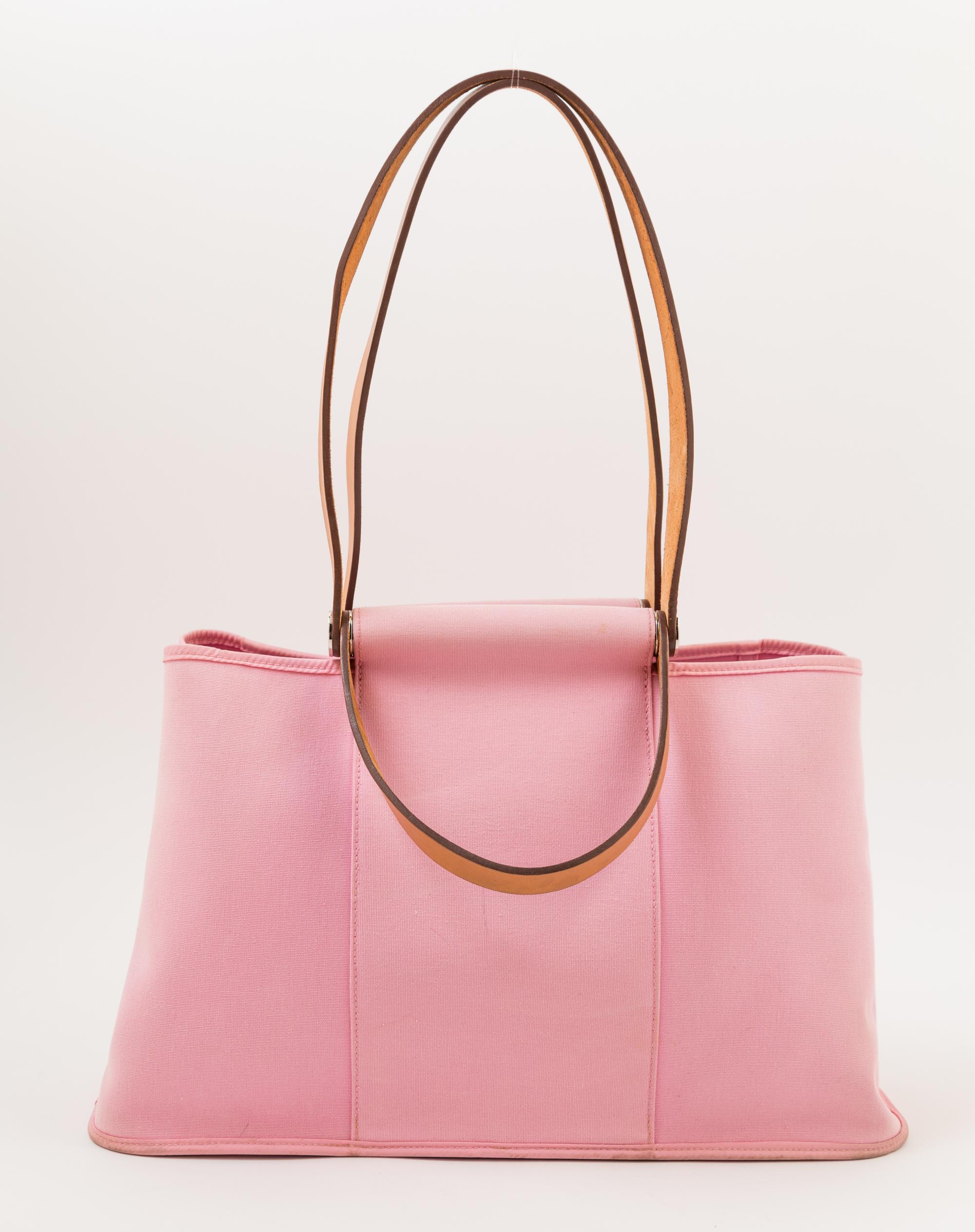 An Hermès Pink Toile Canvas Cabag Tote, 15.5" x 9.25" x 5.75"; Handle drop: 5".