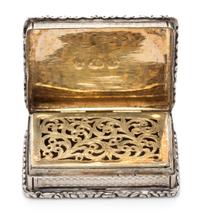A William IV Silver Vinaigrette, John Bettridge, Birmingham, 1832, the case with an engine turned and volute decorated border.