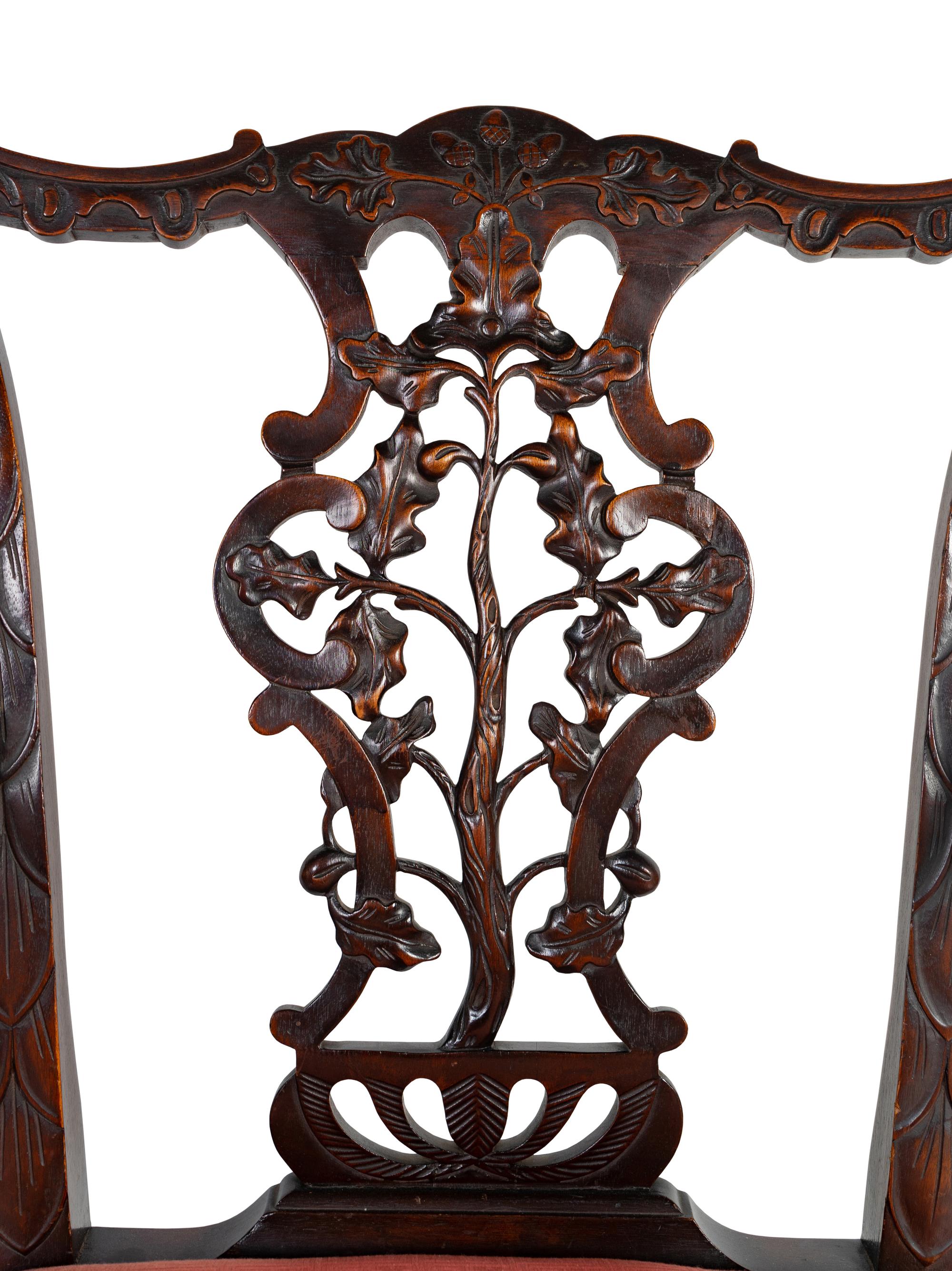 A Pair of George III Style Carved Mahogany Armchairs