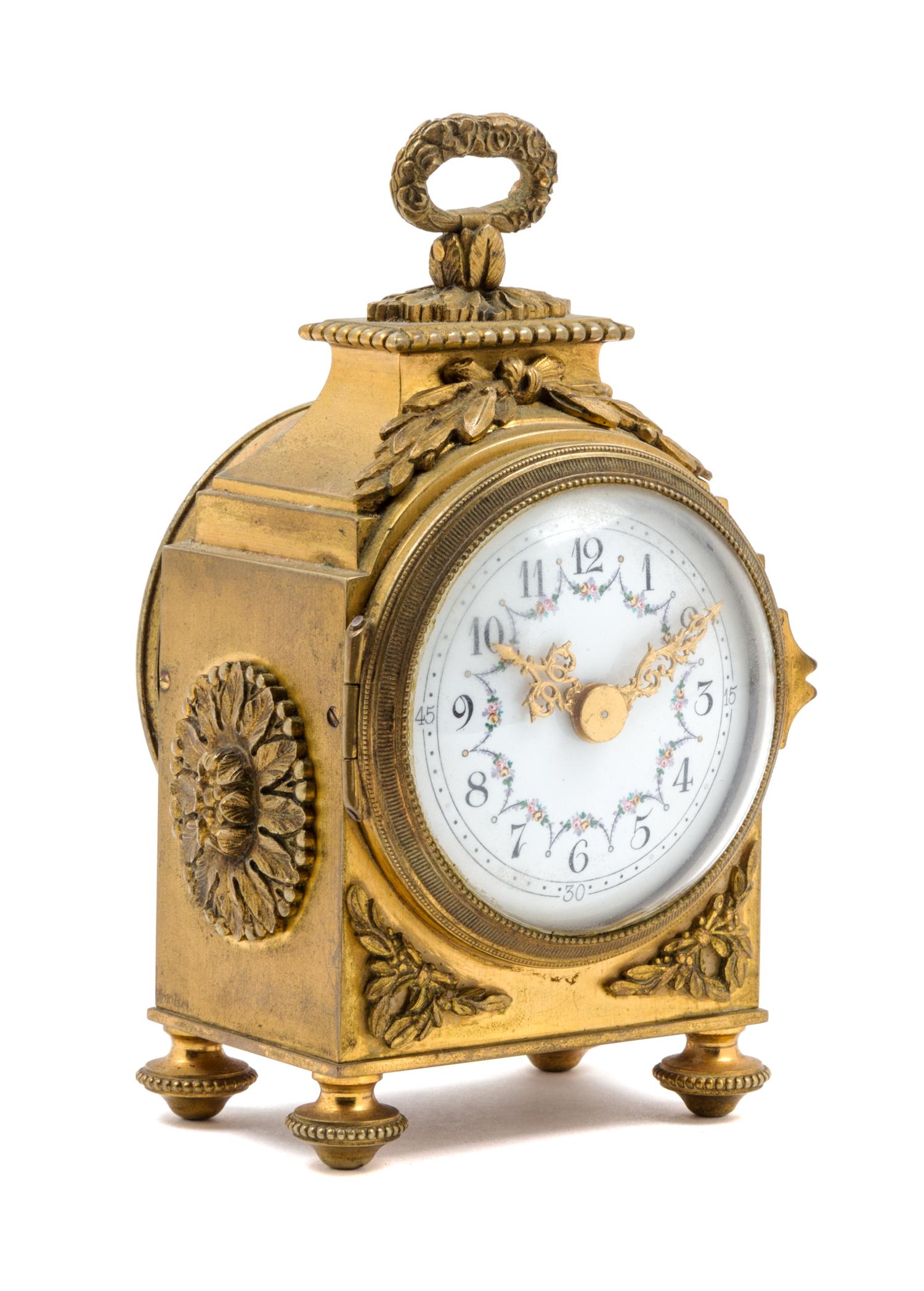 A French Gilt Bronze Carriage Clock Height 6 inches.