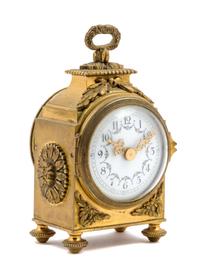 A French Gilt Bronze Carriage Clock Height 6 inches.