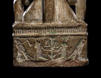 An Egyptian Glazed Steatite Amulet of Pataikos on Crocodiles