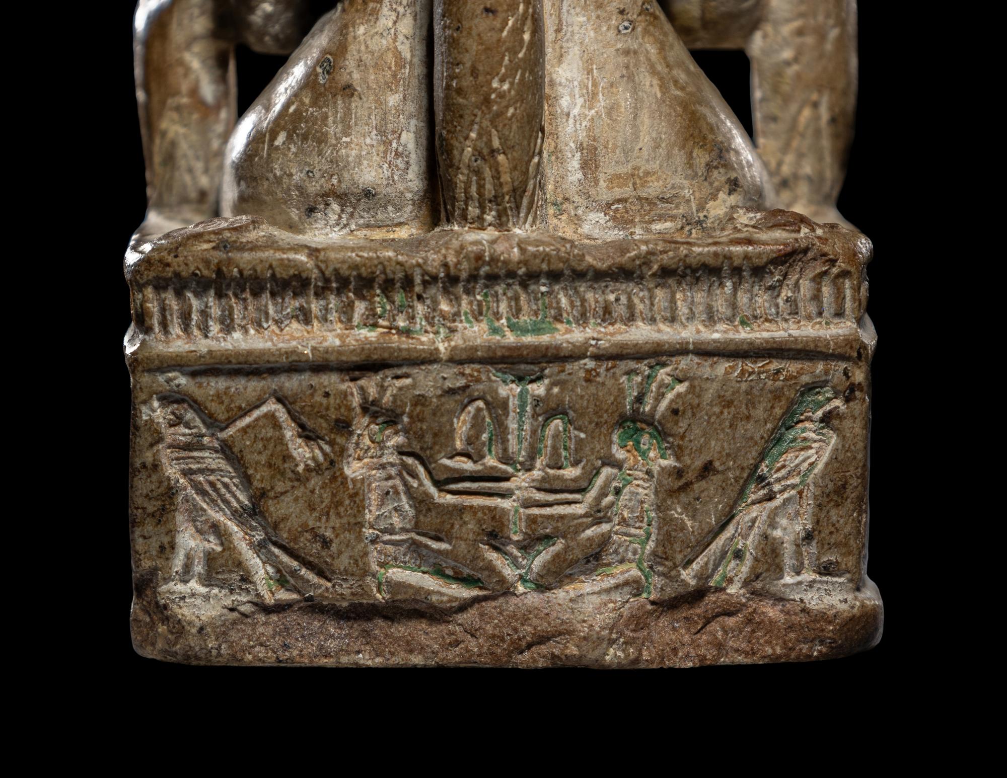 An Egyptian Glazed Steatite Amulet of Pataikos on Crocodiles