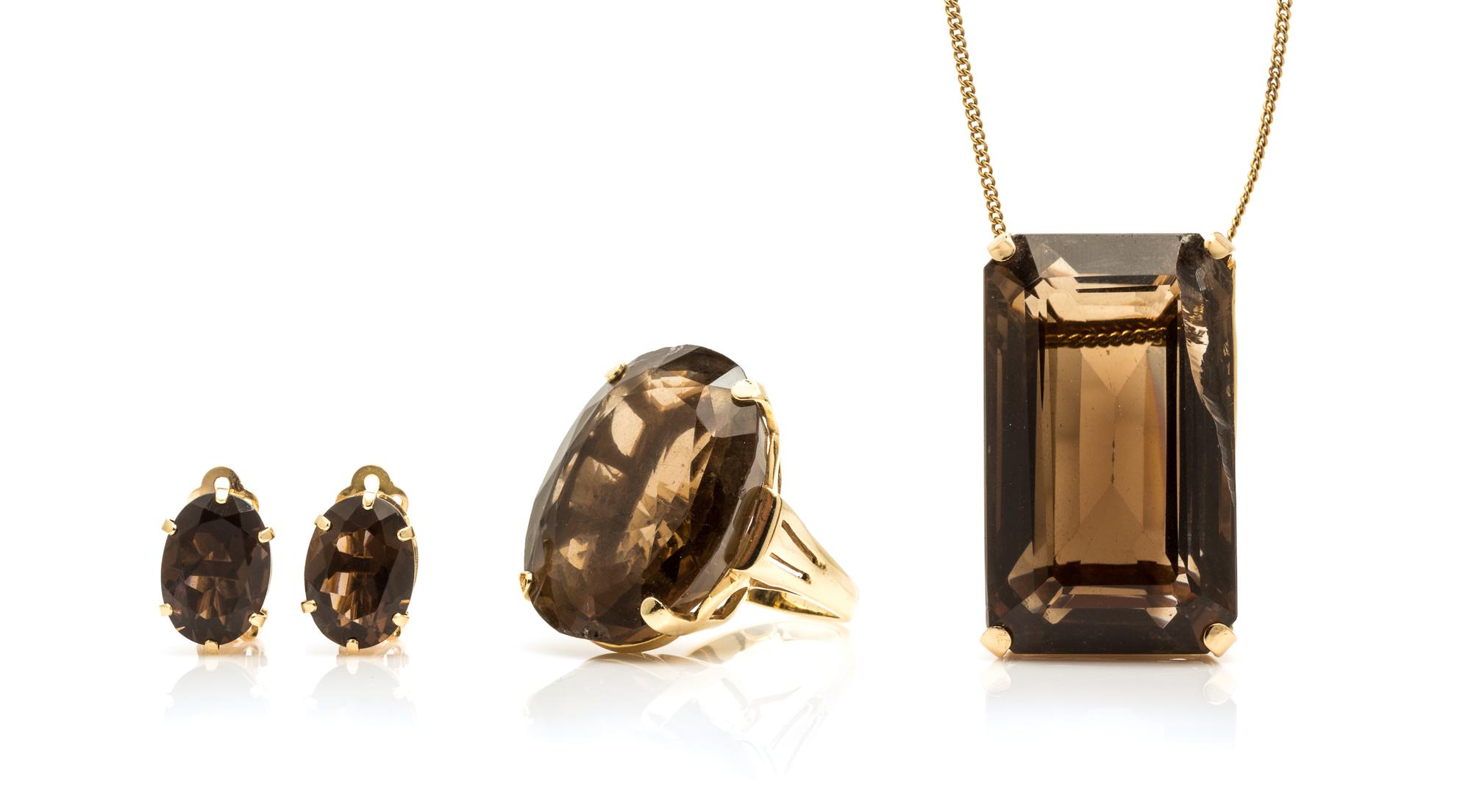 A Collection of Yellow Gold and Smoky Quartz Jewelry, 38.40 dwts.