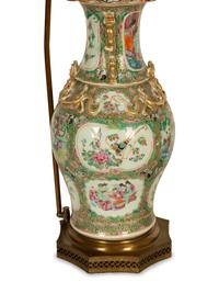 A Pair of Chinese Rose Medallion Porcelain Vases Mounted on Brass Lamp Stands