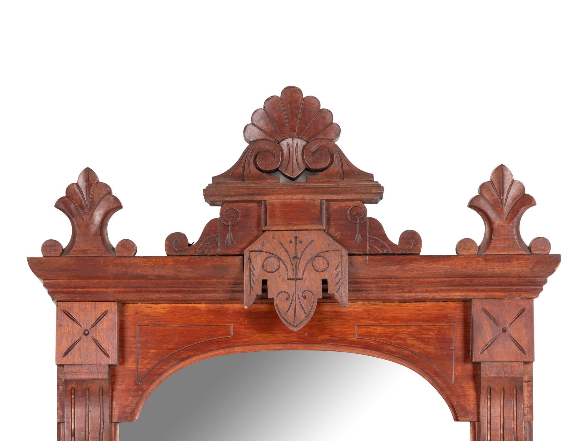 A Victorian Carved Mahogany Mirror