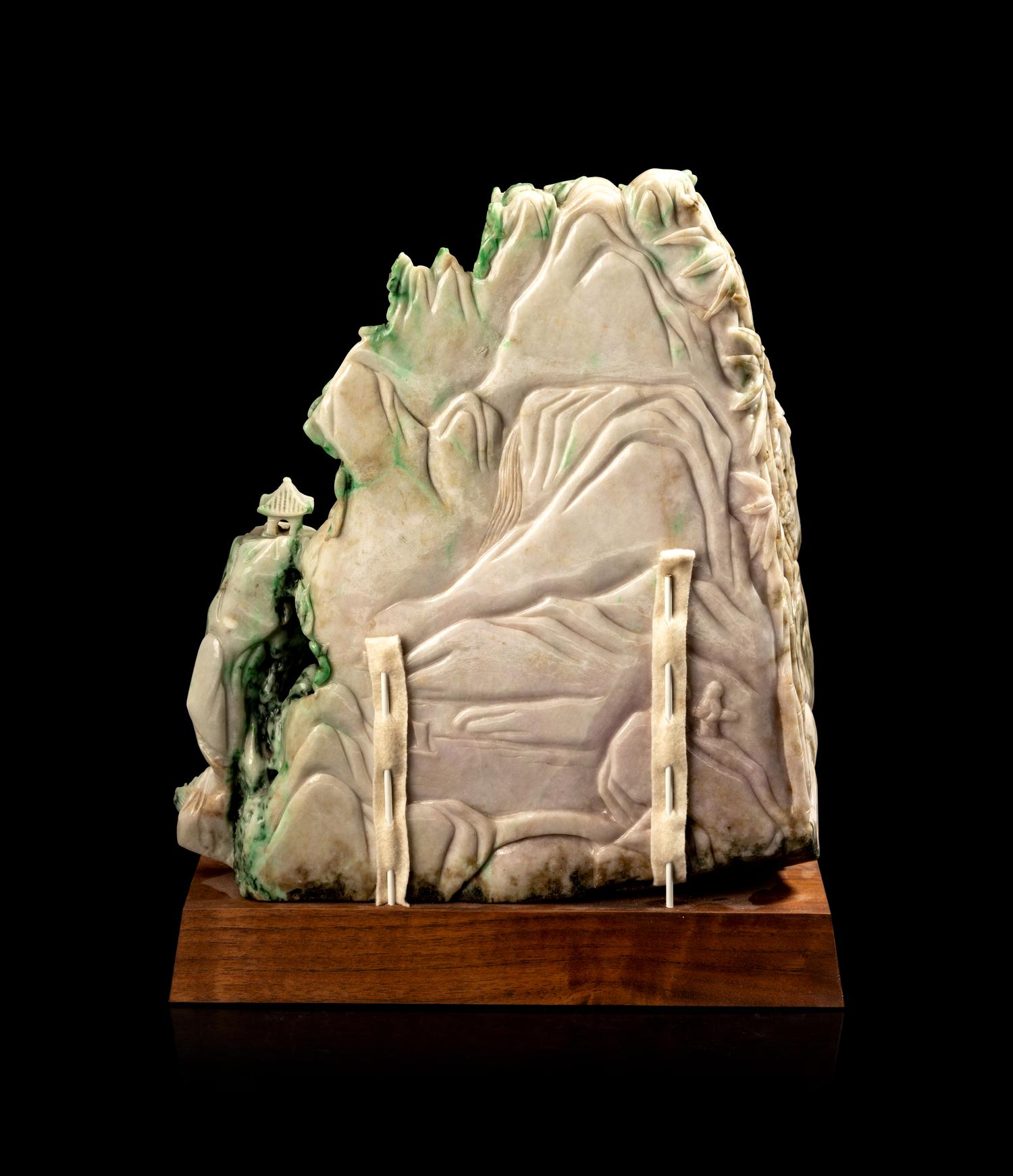 A Chinese Export Carved Jadeite Model of Buddha Within a Mountain