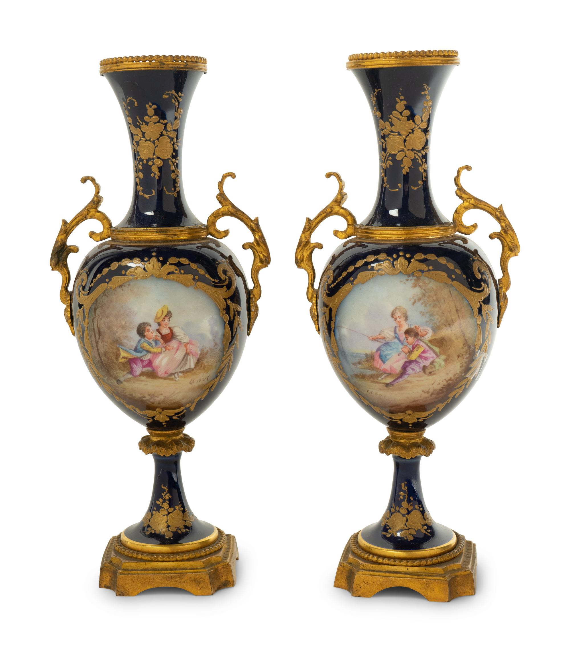 A Pair of Sèvres Style Gilt Bronze Mounted Porcelain Baluster Vases — 19TH CENTURY