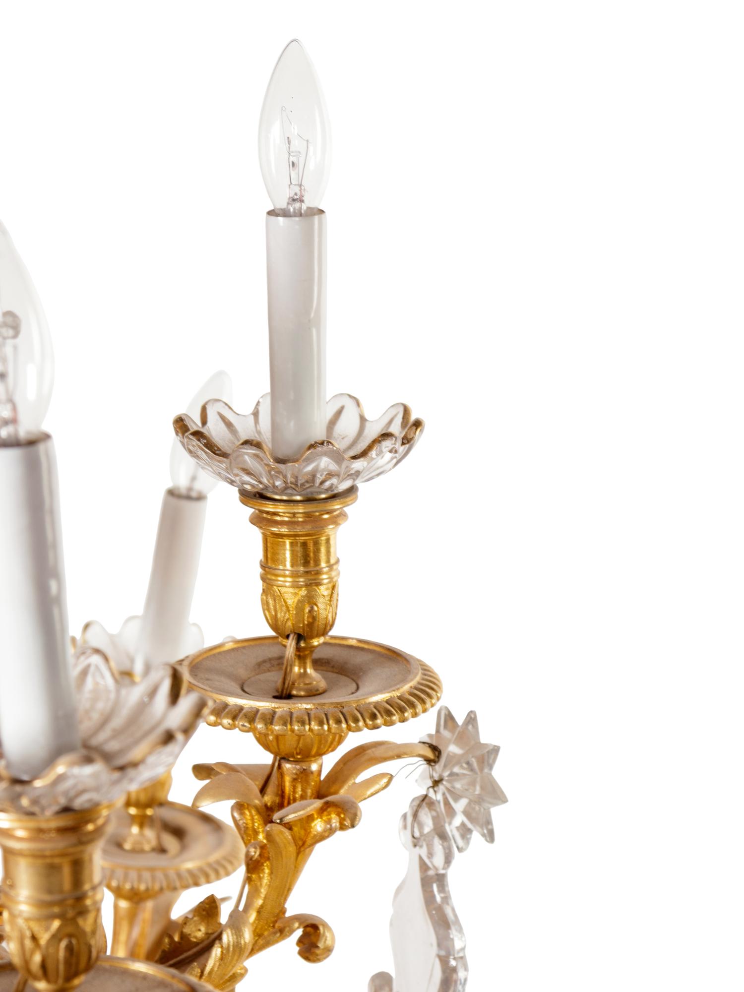 A Louis XV Style Gilt Bronze and Cut Glass Chandelier