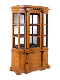 A German or Austrian Neoclassical Parcel Ebonized Birch Breakfront Vitrine Cabinet