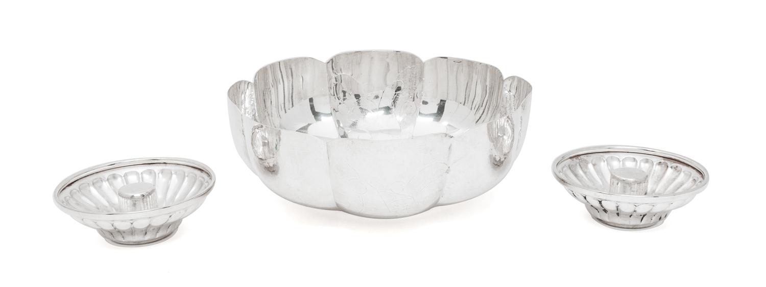 Two Mexican Silver Articles, Various Makers, comprising a lobed bowl with etched decoration to interior, and a pair of candlesticks.