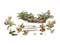 A Boehm Porcelain Orchid and Hummingbird Centerpiece