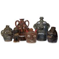 Group of five glazed stoneware face jugs and one figure various artists, Southern States, late 20th century