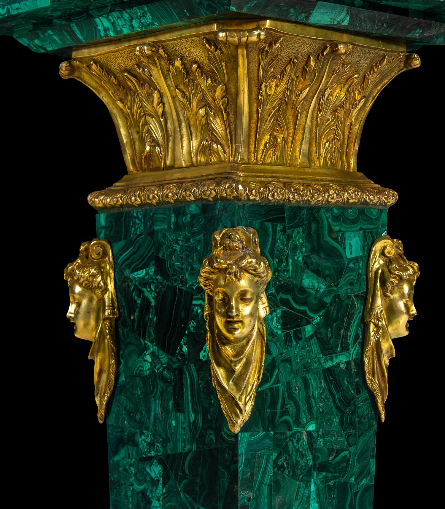 A Pair of Louis XVI Style Gilt Bronze Mounted Malachite Pedestals